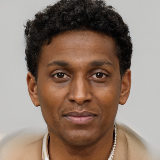 Neutral latino young-adult male with short  brown hair and brown eyes