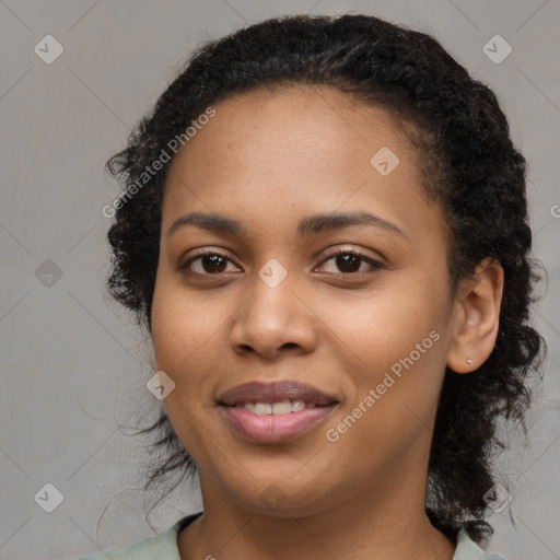 Joyful black young-adult female with medium  black hair and brown eyes