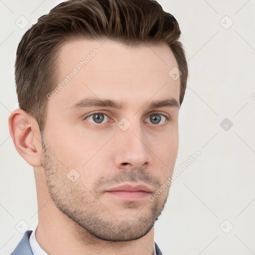 Neutral white young-adult male with short  brown hair and grey eyes