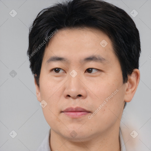 Neutral asian young-adult male with short  black hair and brown eyes