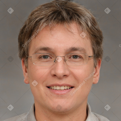 Joyful white adult male with short  brown hair and brown eyes