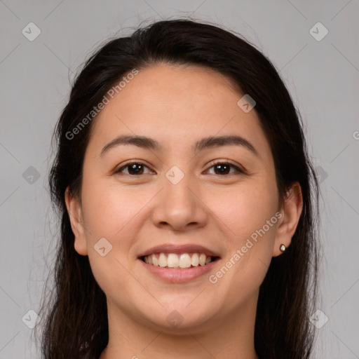 Joyful white young-adult female with long  brown hair and brown eyes