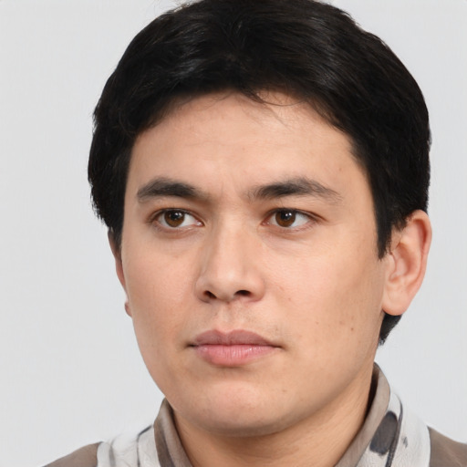 Neutral white young-adult male with short  black hair and brown eyes