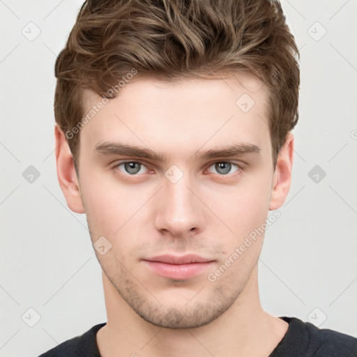 Neutral white young-adult male with short  brown hair and grey eyes