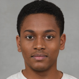 Neutral black young-adult male with short  brown hair and brown eyes