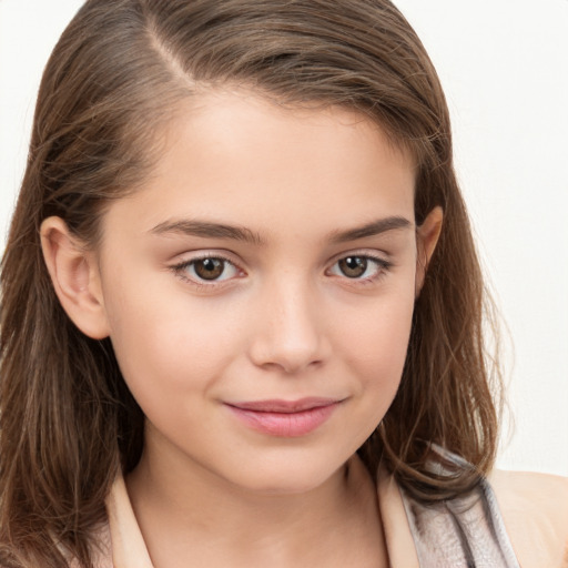 Joyful white child female with medium  brown hair and brown eyes