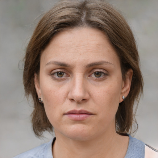 Neutral white adult female with medium  brown hair and brown eyes