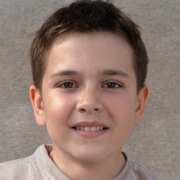 Joyful white child male with short  brown hair and brown eyes