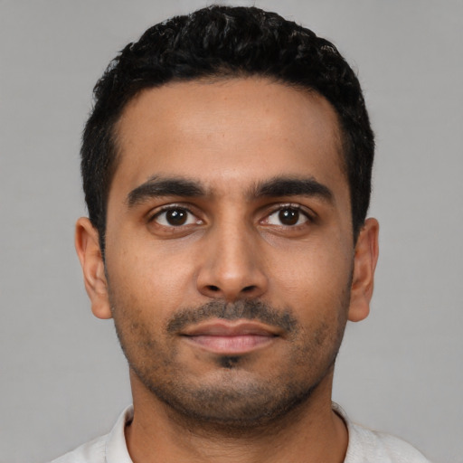 Neutral latino young-adult male with short  black hair and brown eyes