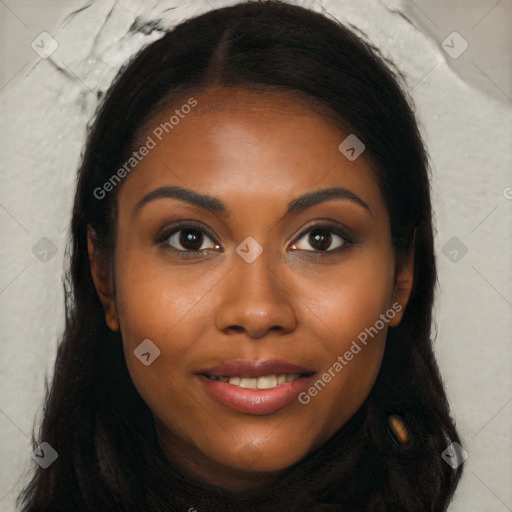 Joyful black young-adult female with long  brown hair and brown eyes