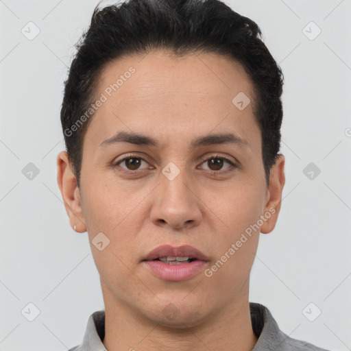 Joyful white adult male with short  brown hair and brown eyes