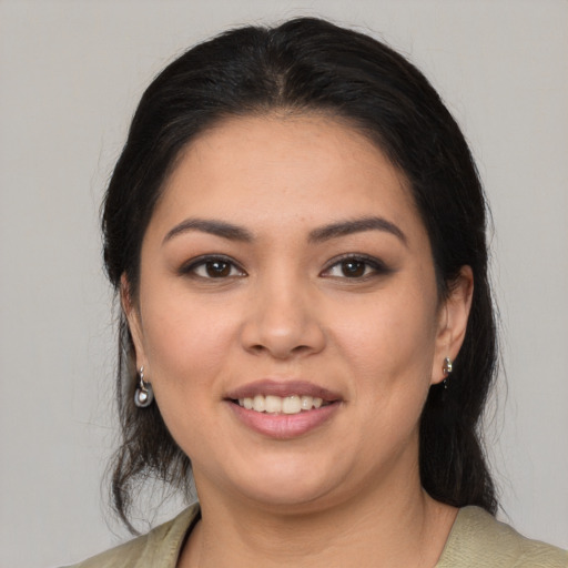 Joyful white young-adult female with medium  brown hair and brown eyes