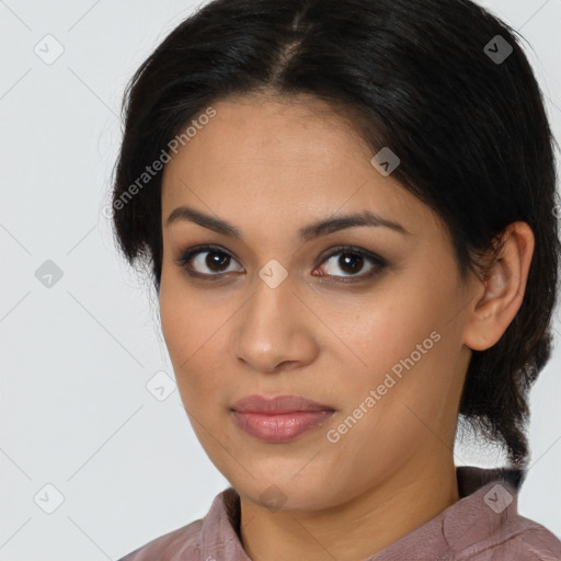 Joyful latino young-adult female with medium  brown hair and brown eyes