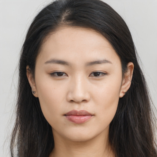 Neutral asian young-adult female with long  brown hair and brown eyes