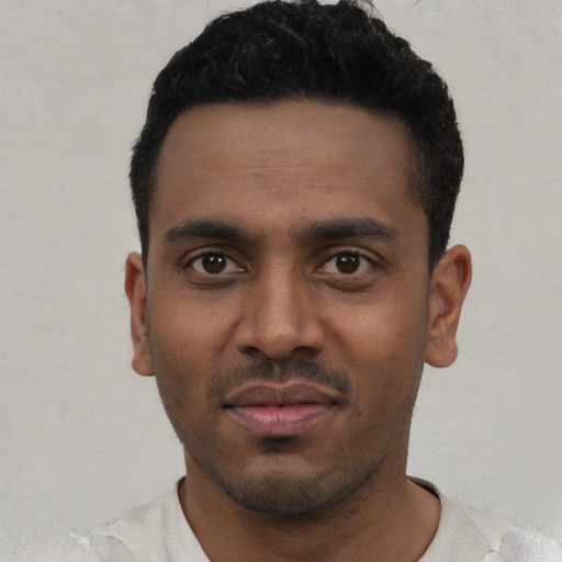 Neutral latino young-adult male with short  black hair and brown eyes
