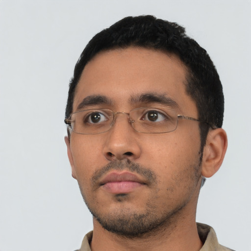 Neutral latino young-adult male with short  black hair and brown eyes