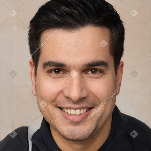 Joyful white adult male with short  brown hair and brown eyes