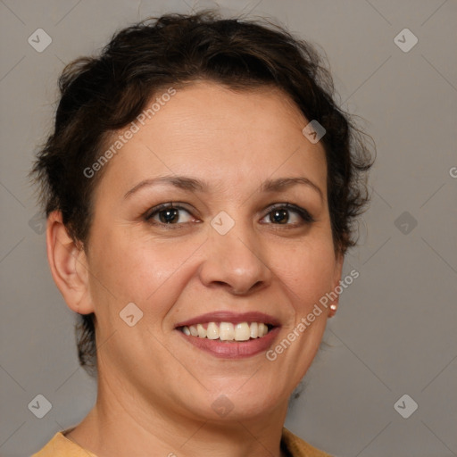 Joyful white adult female with short  brown hair and brown eyes