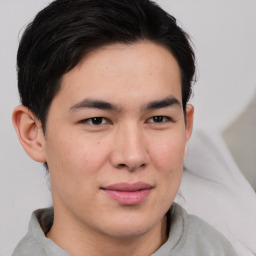 Joyful white young-adult male with medium  brown hair and brown eyes