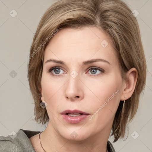 Neutral white young-adult female with medium  brown hair and grey eyes