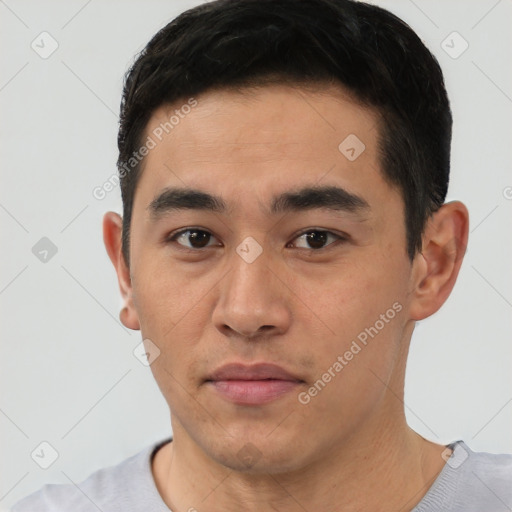 Neutral white young-adult male with short  black hair and brown eyes
