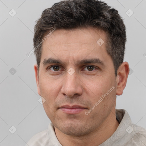 Neutral white adult male with short  brown hair and brown eyes