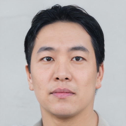 Neutral asian young-adult male with short  black hair and brown eyes