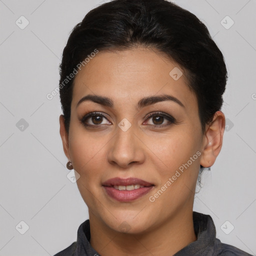 Joyful latino young-adult female with medium  brown hair and brown eyes