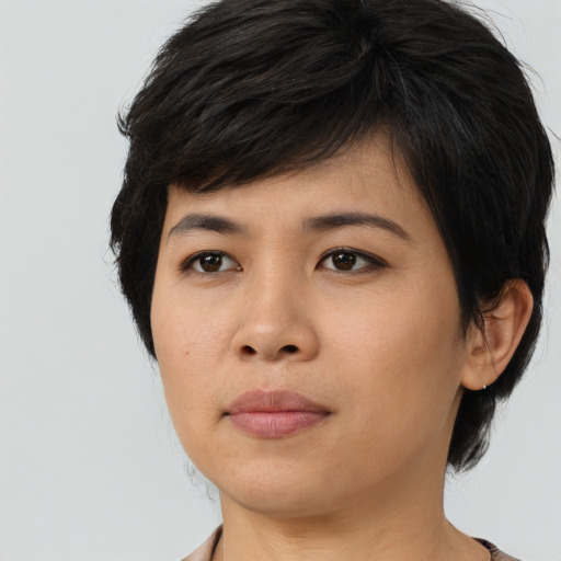 Neutral asian young-adult female with medium  black hair and brown eyes