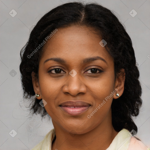 Joyful black young-adult female with medium  brown hair and brown eyes