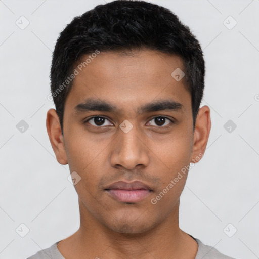 Neutral latino young-adult male with short  black hair and brown eyes