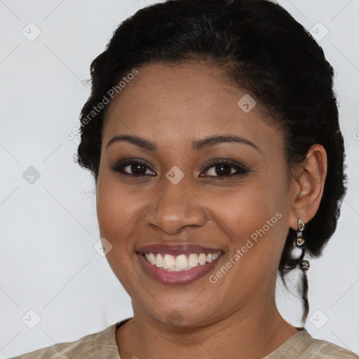 Joyful latino young-adult female with short  brown hair and brown eyes