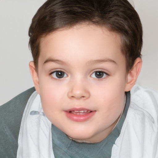 Joyful white child female with short  brown hair and brown eyes