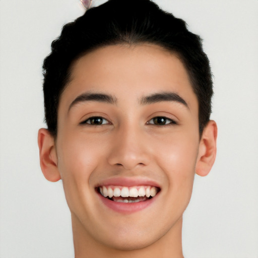 Joyful white young-adult male with short  black hair and brown eyes