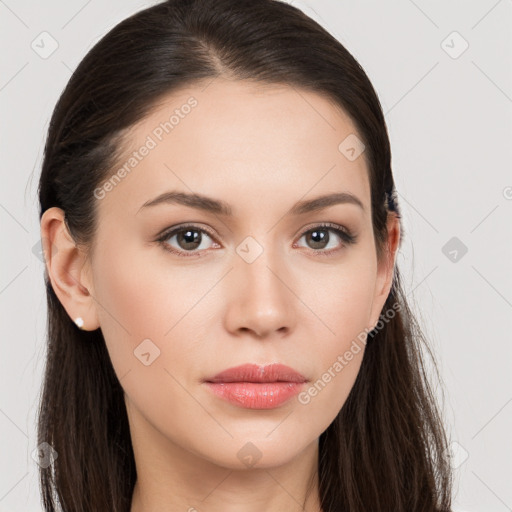 Neutral white young-adult female with long  brown hair and brown eyes