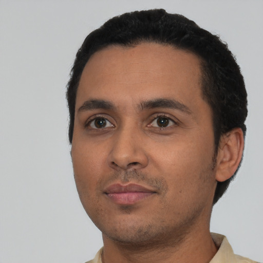 Neutral latino young-adult male with short  black hair and brown eyes
