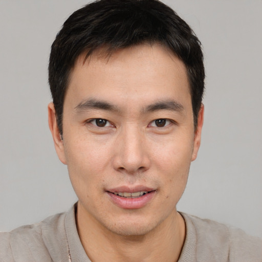 Neutral asian young-adult male with short  black hair and brown eyes