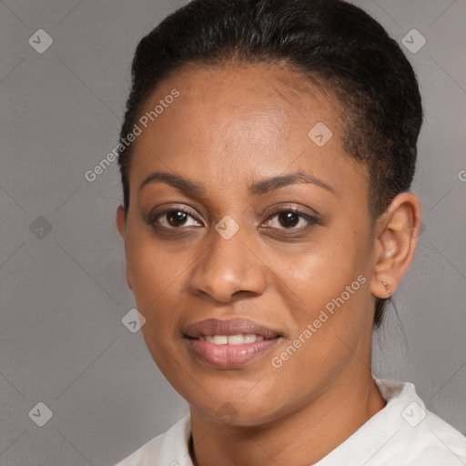 Joyful black young-adult female with short  brown hair and brown eyes