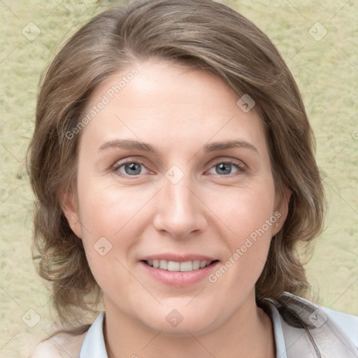 Joyful white young-adult female with medium  brown hair and blue eyes