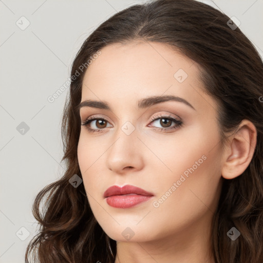 Neutral white young-adult female with long  brown hair and brown eyes