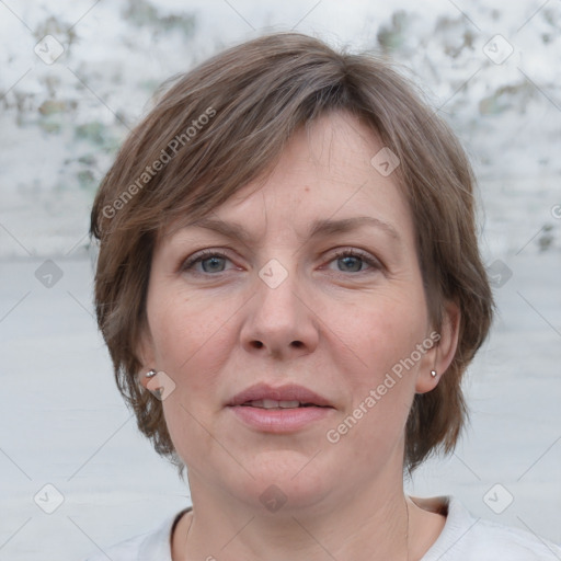 Joyful white adult female with medium  brown hair and grey eyes