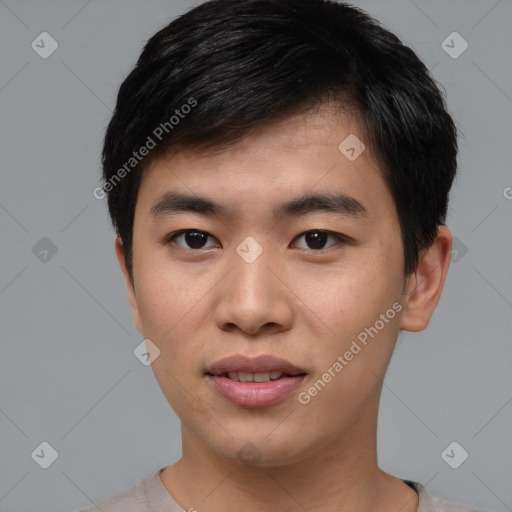 Joyful asian young-adult male with short  black hair and brown eyes