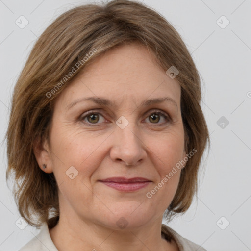 Joyful white adult female with medium  brown hair and grey eyes