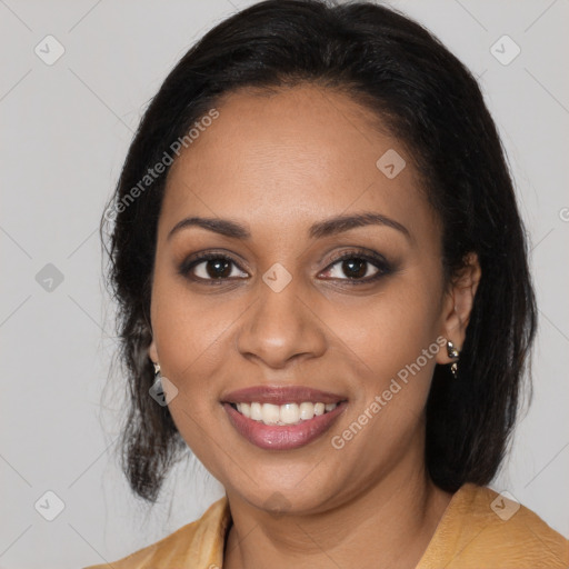 Joyful black young-adult female with medium  brown hair and brown eyes