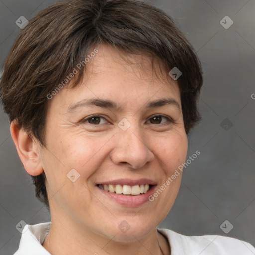 Joyful white adult female with medium  brown hair and brown eyes