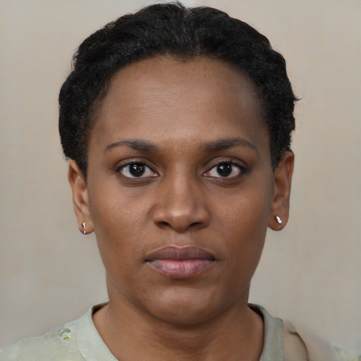 Neutral black young-adult female with short  black hair and brown eyes