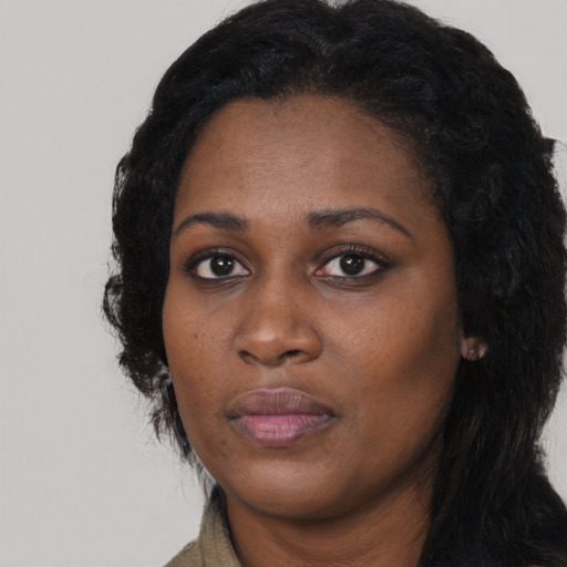 Neutral black young-adult female with long  black hair and brown eyes