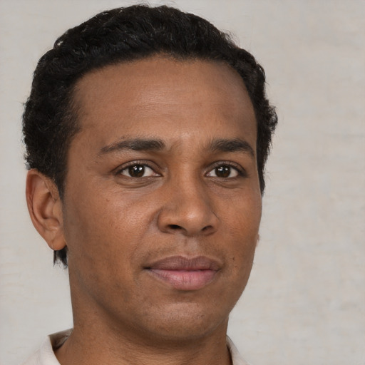 Neutral black young-adult male with short  brown hair and brown eyes