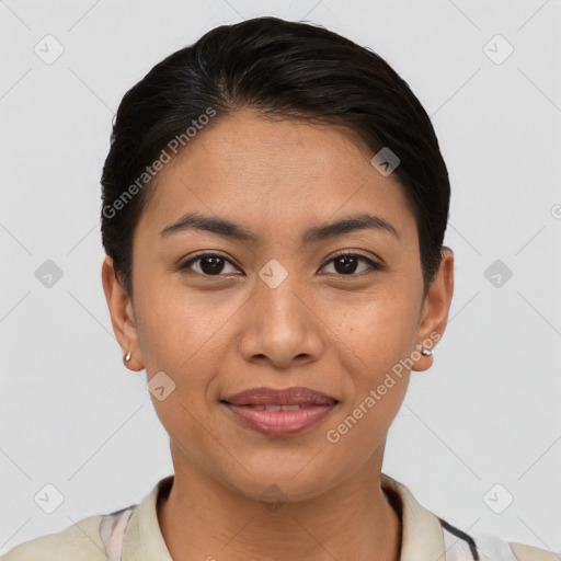 Joyful latino young-adult female with short  brown hair and brown eyes