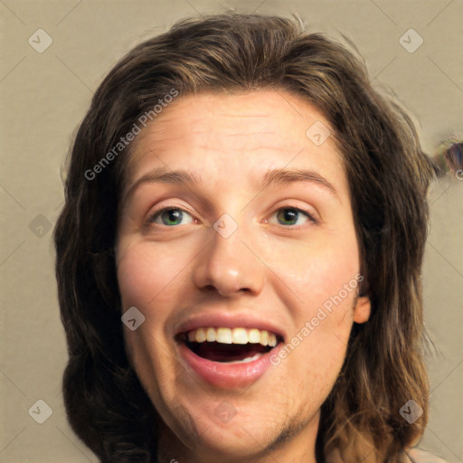 Joyful white young-adult female with long  brown hair and green eyes